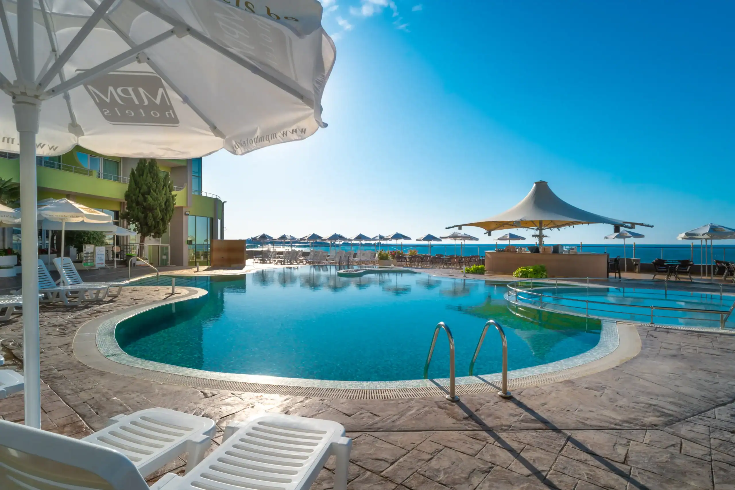 Outdoor pool area at MPM Hotel Arsena