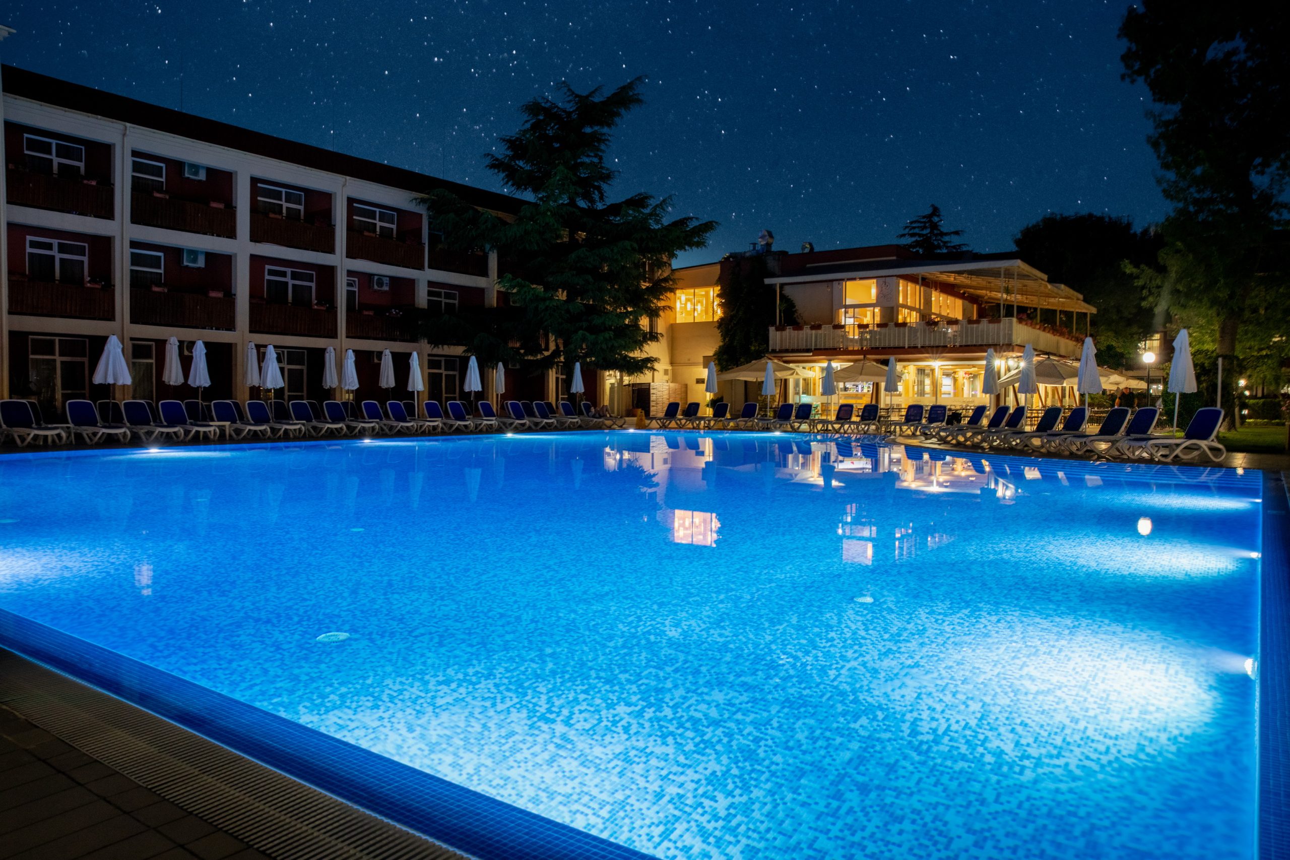 Asteria Family Sunny Beach — evening pool and hotel exterior, official photograph
