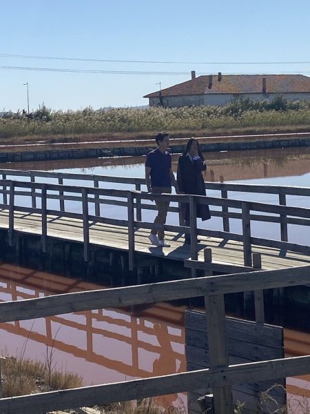 DARA and another person beside the saltwater pools at Atanasovsko Lake during her Burgas visit